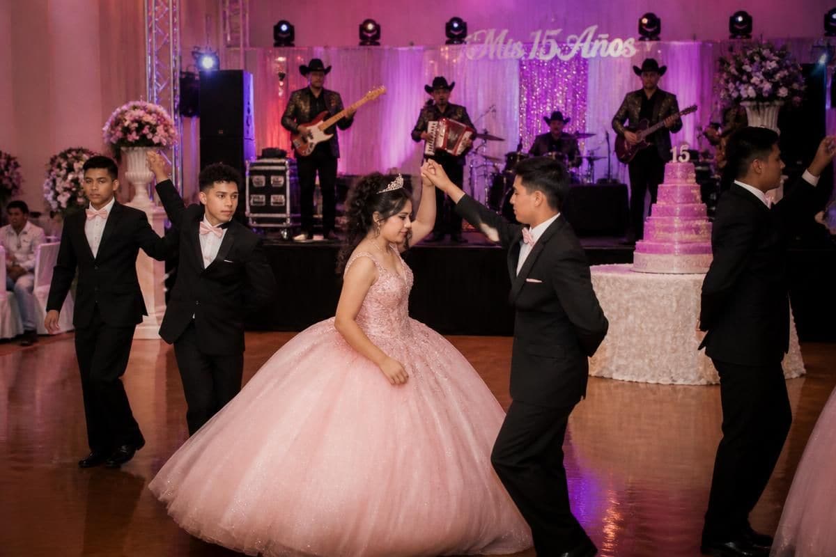 El Kompa Roger norteño band playing the vals at a quinceañera in the Chicago area